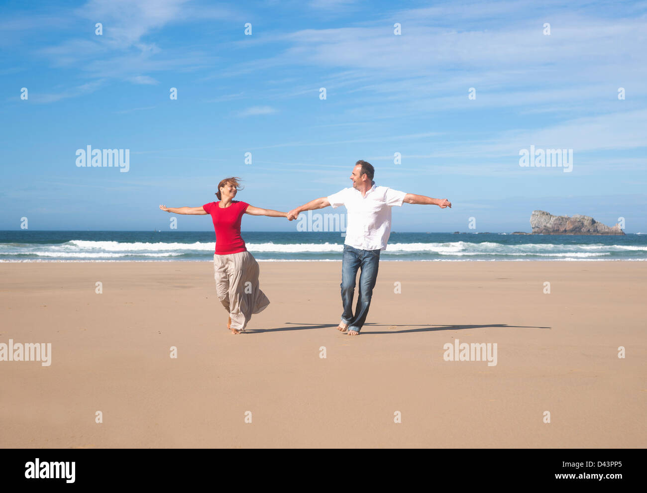 Couple Holding Hands on the Beach, Camaret-sur-Mer, Crozon Peninsula, Finistere, Brittany, France Stock Photo