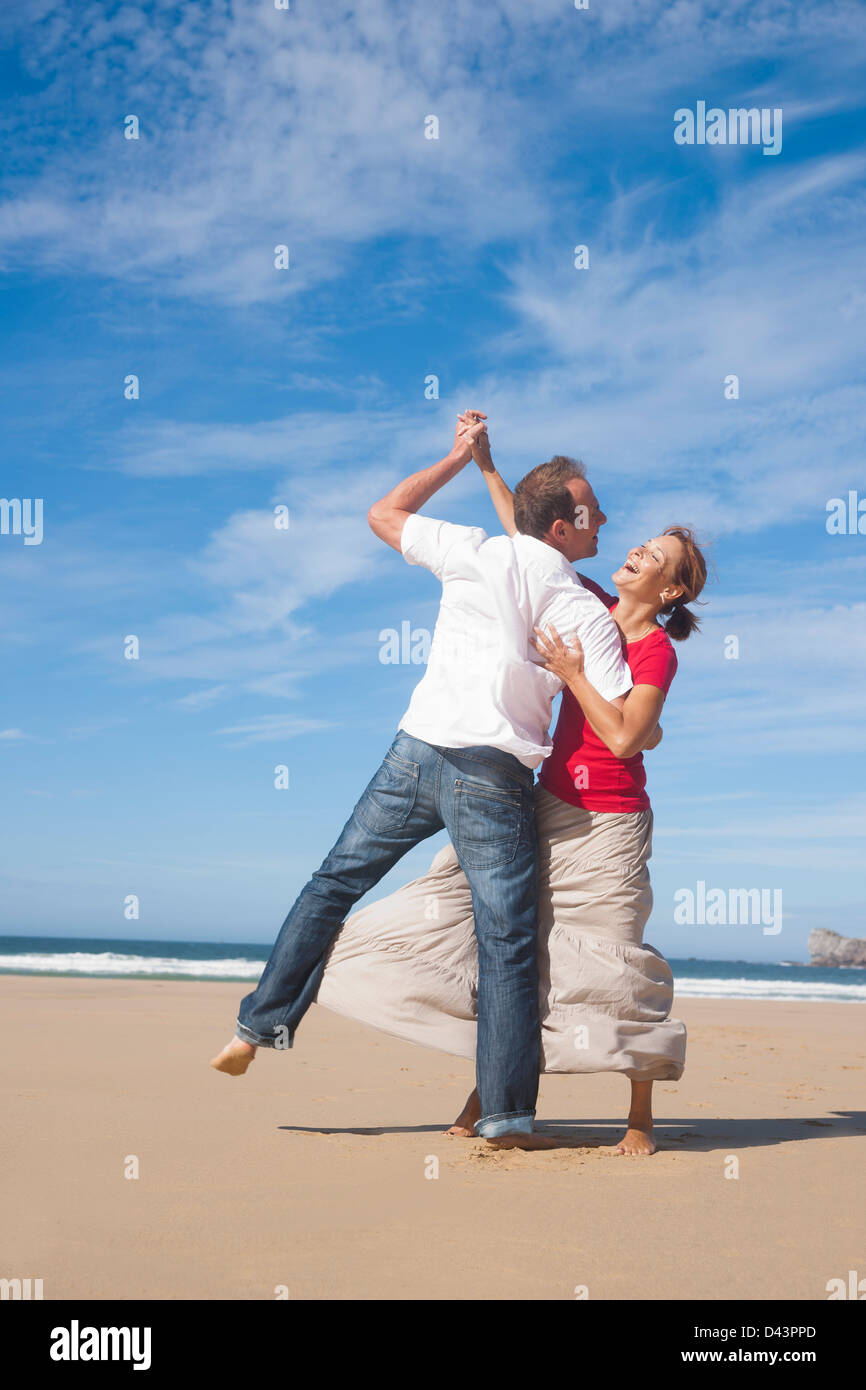 Couple Dancing on the Beach, Camaret-sur-Mer, Crozon Peninsula, Finistere, Brittany, France Stock Photo
