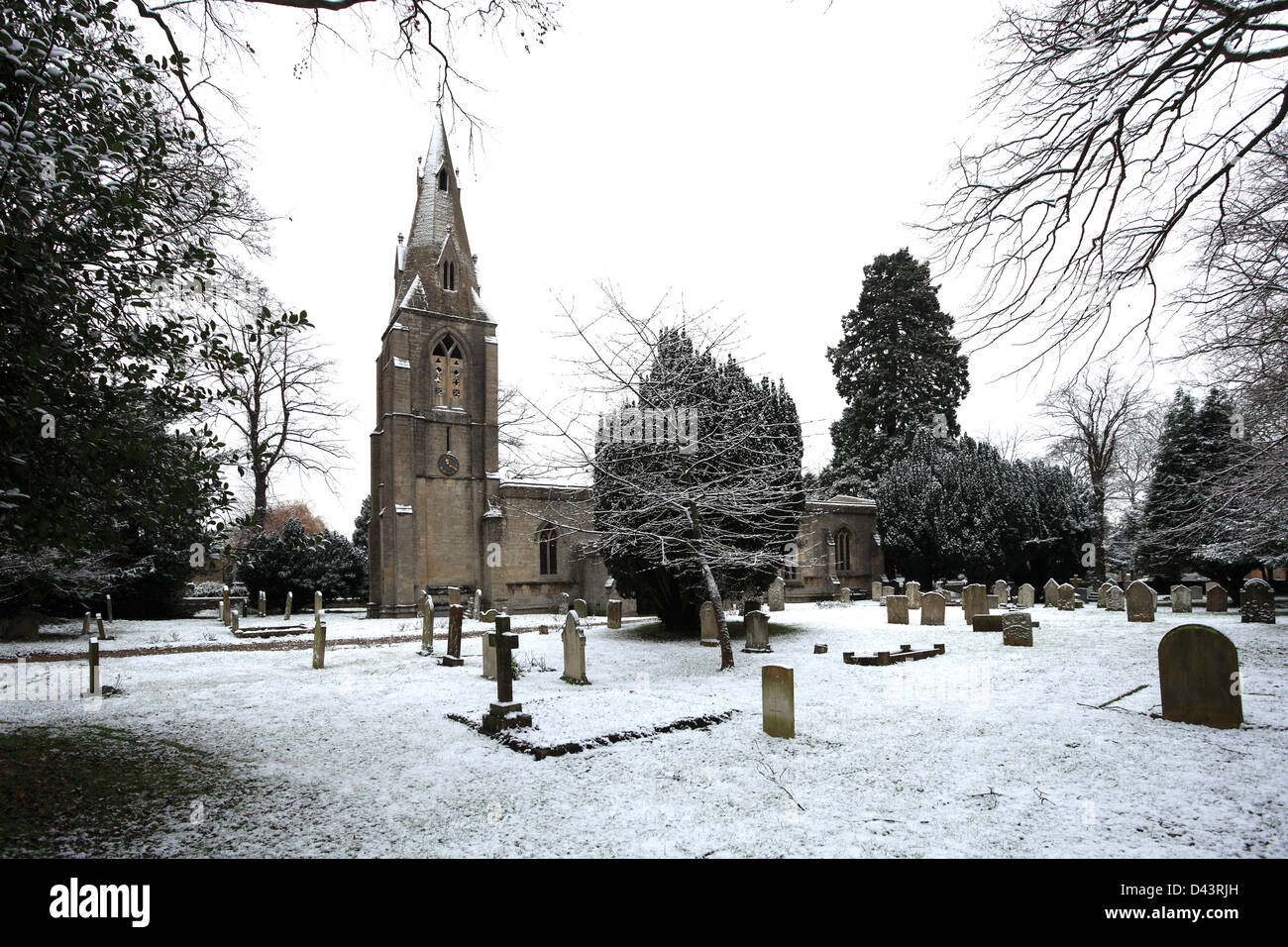 Winter snow, St Marys parish church, Bainton village, Cambridgeshire, England; Britain; UK Stock Photo