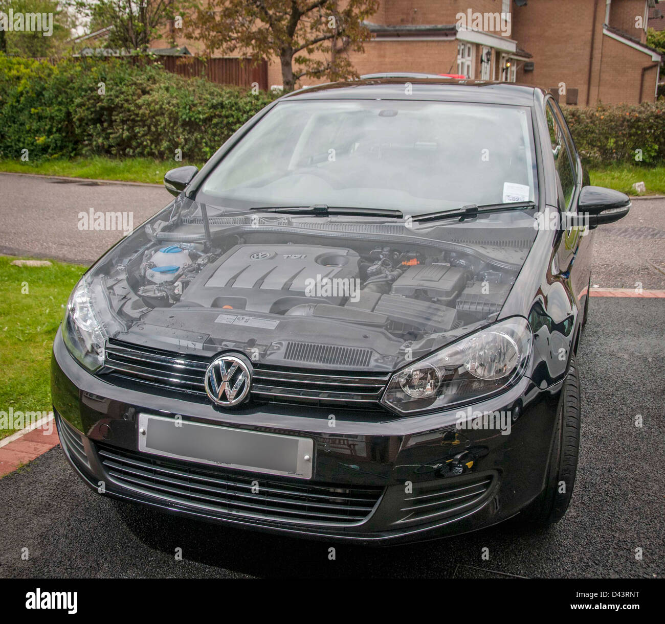 Volkswagen Golf car with engine visible through bonnet Stock Photo - Alamy