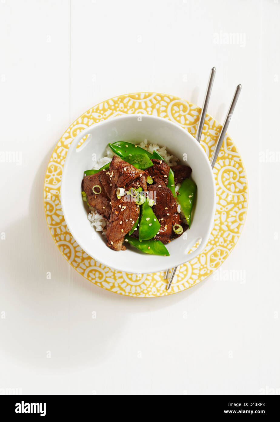 Beef and Snow Peas on Rice Stock Photo