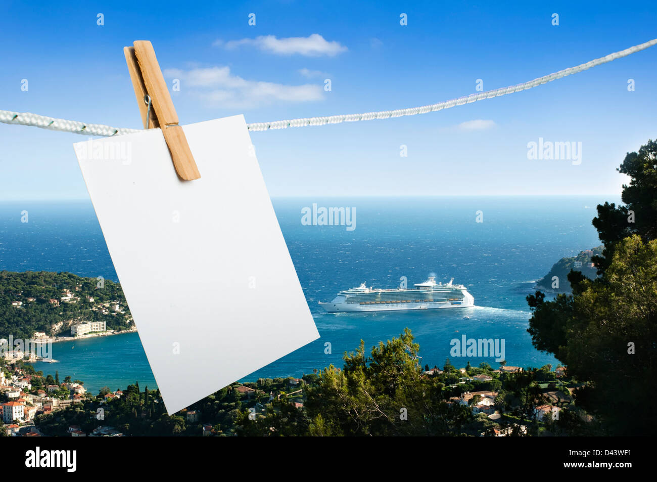 Note paper hooked on a rope. Big cruise ship on the background Stock ...