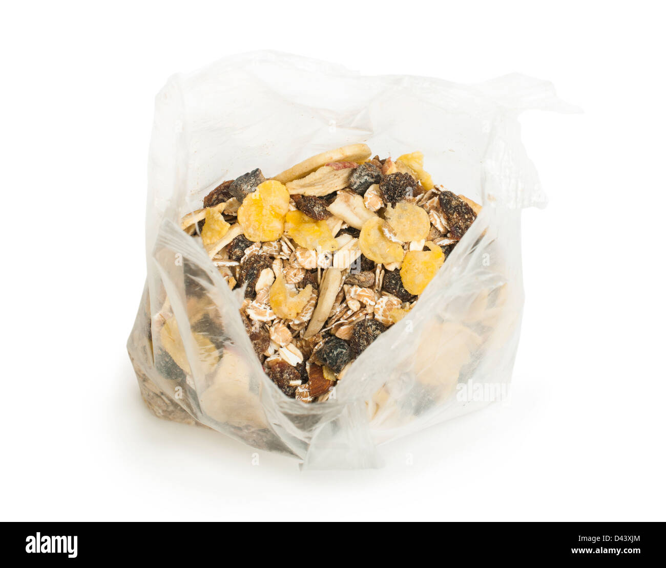 Muesli breakfast in transparent package. White isolated Stock Photo
