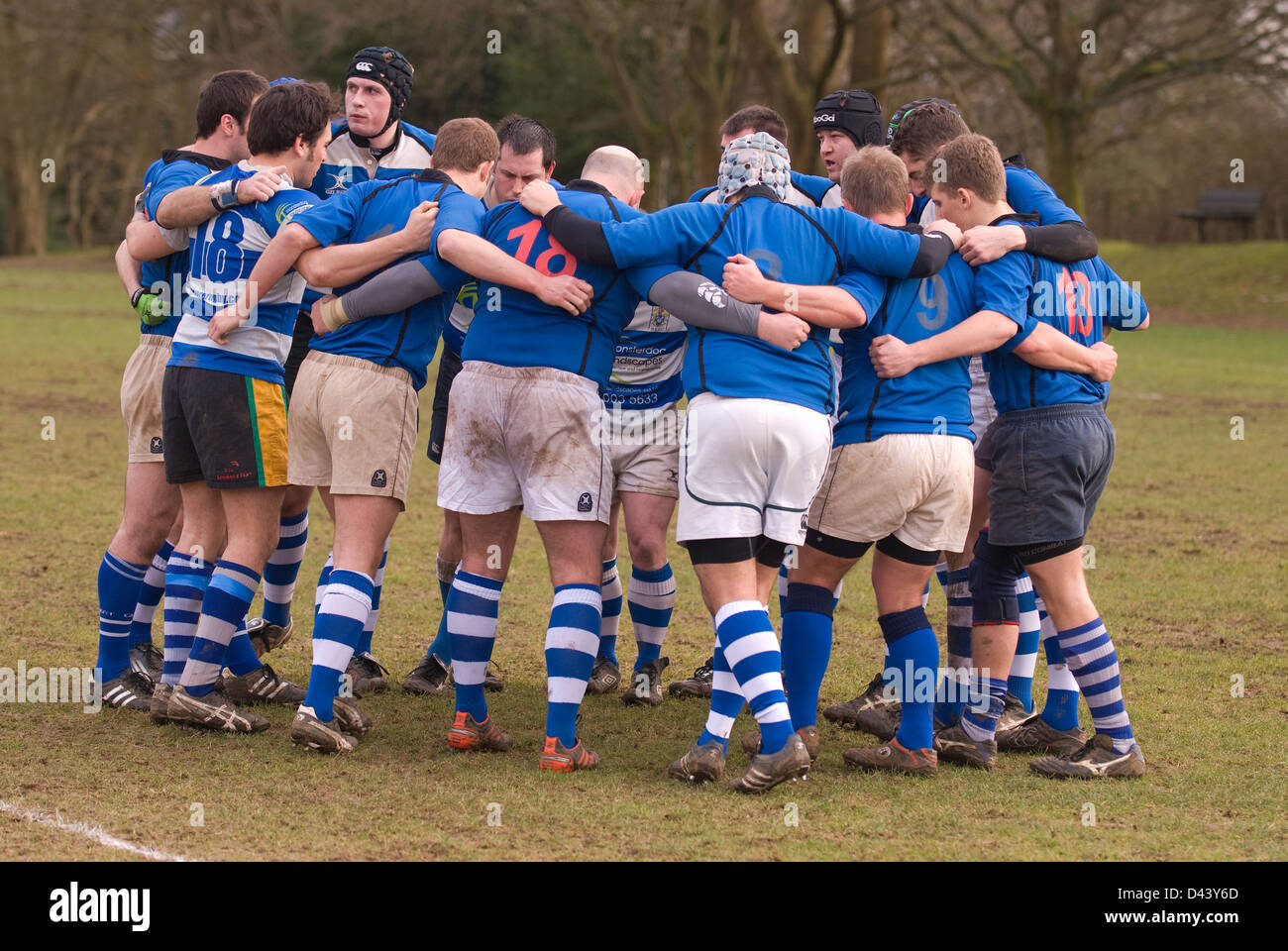 Haslemere rugby players huddle together for a team building talk prior to their match against Merton, Haslemere, Surrey, UK. Stock Photo