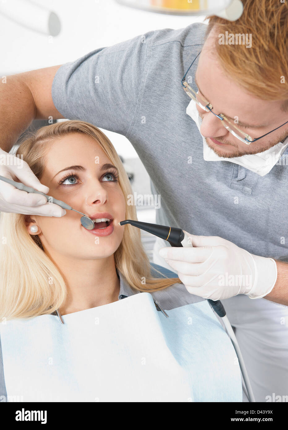 Young Woman and Dentist at Dentist's Office for Appointment, Germany