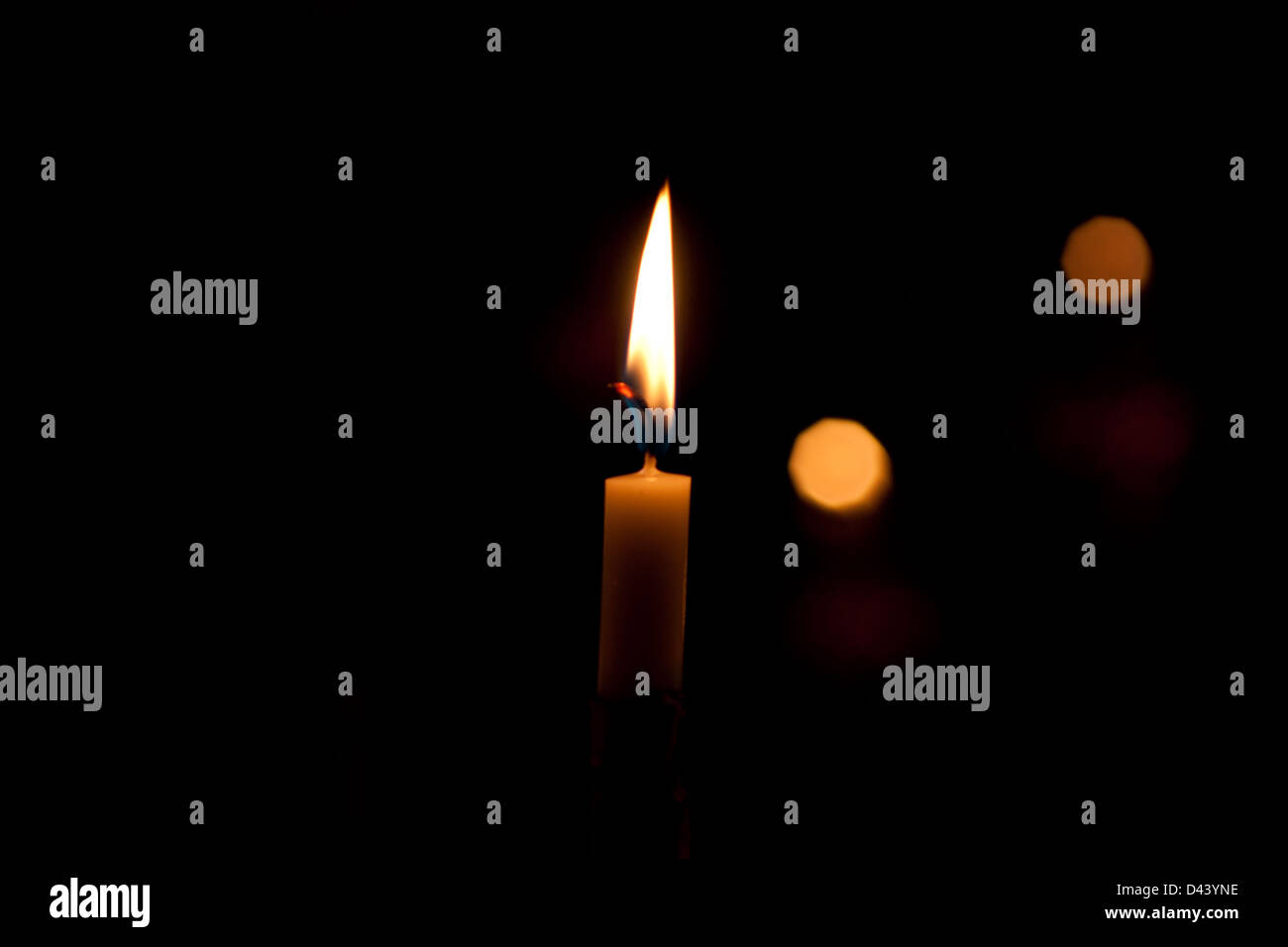 Lit candle with melted wax - Stock Image - C036/0272 - Science