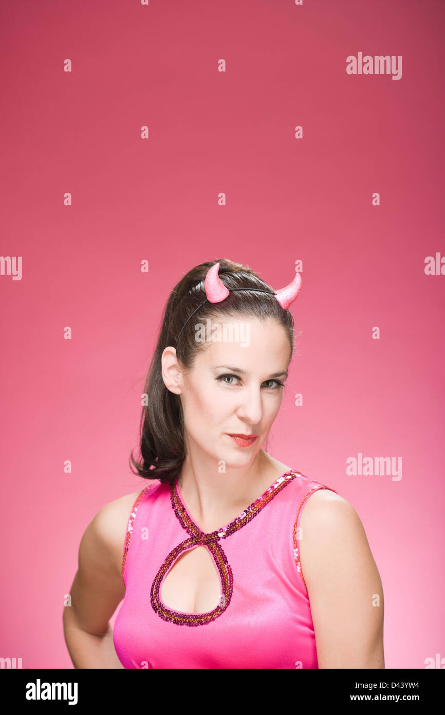 Portrait of Woman Wearing Devil Horns and Making Faces Stock Photo Alamy
