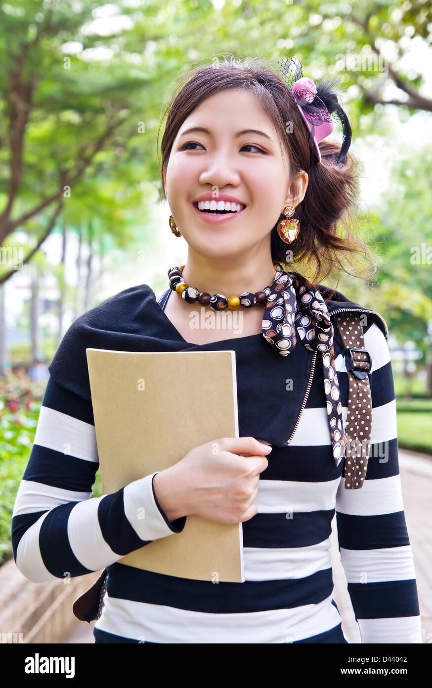 young asian woman wearing a white plaid scarf - Playground