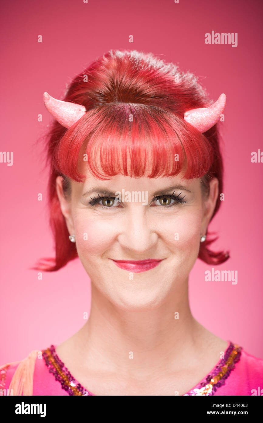 Portrait of Woman Wearing Devil Horns Stock Photo Alamy
