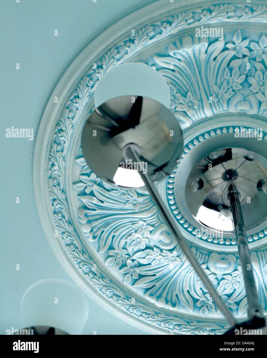 Pastel Blue Plaster Ceiling Rose And Chrome And Glass Light