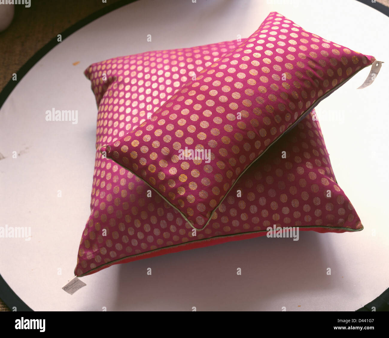 Closeup of gold spotted red cushions Stock Photo Alamy