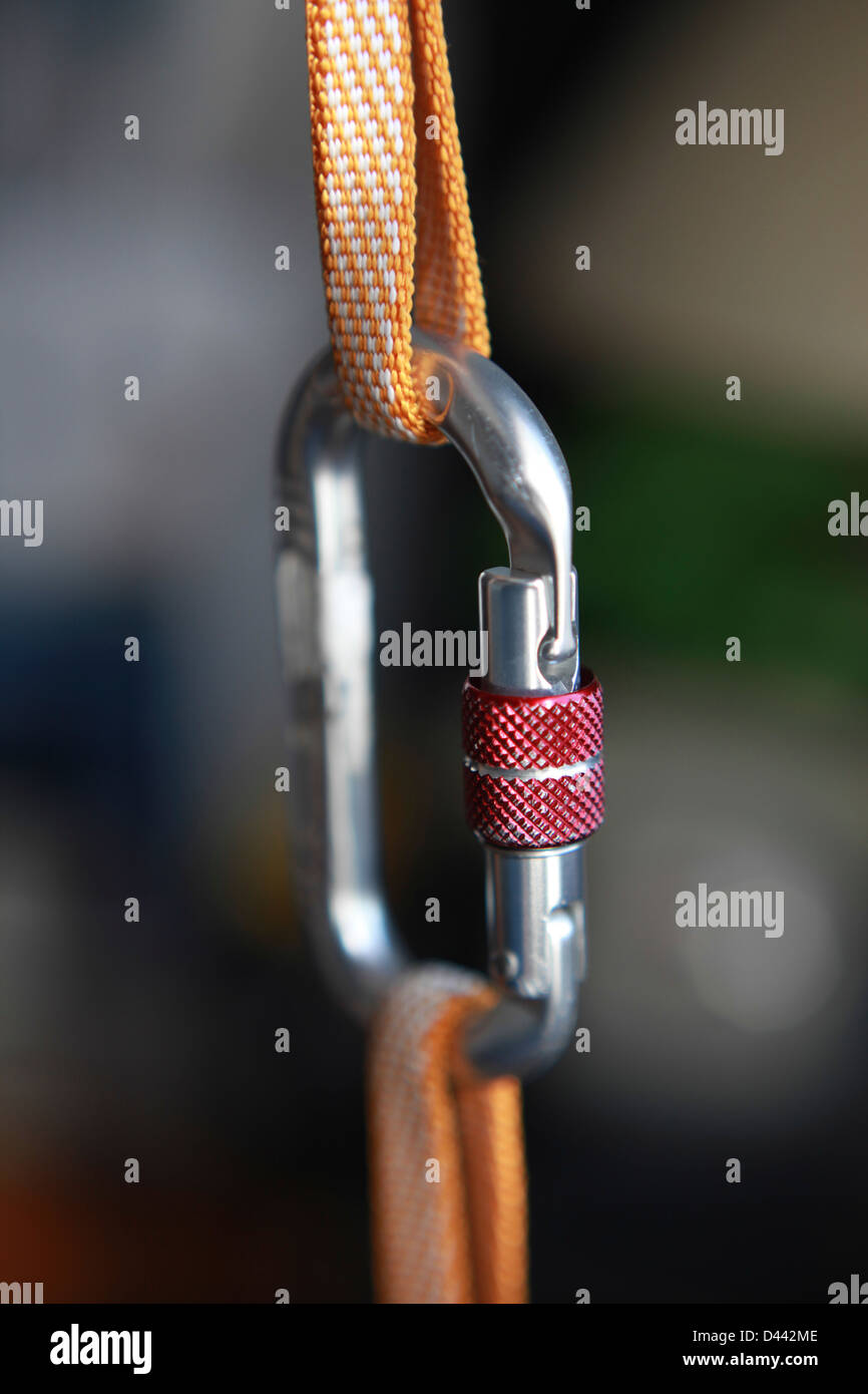 Close up view of a screw gate carabine, equipment for climbing. Stock Photo