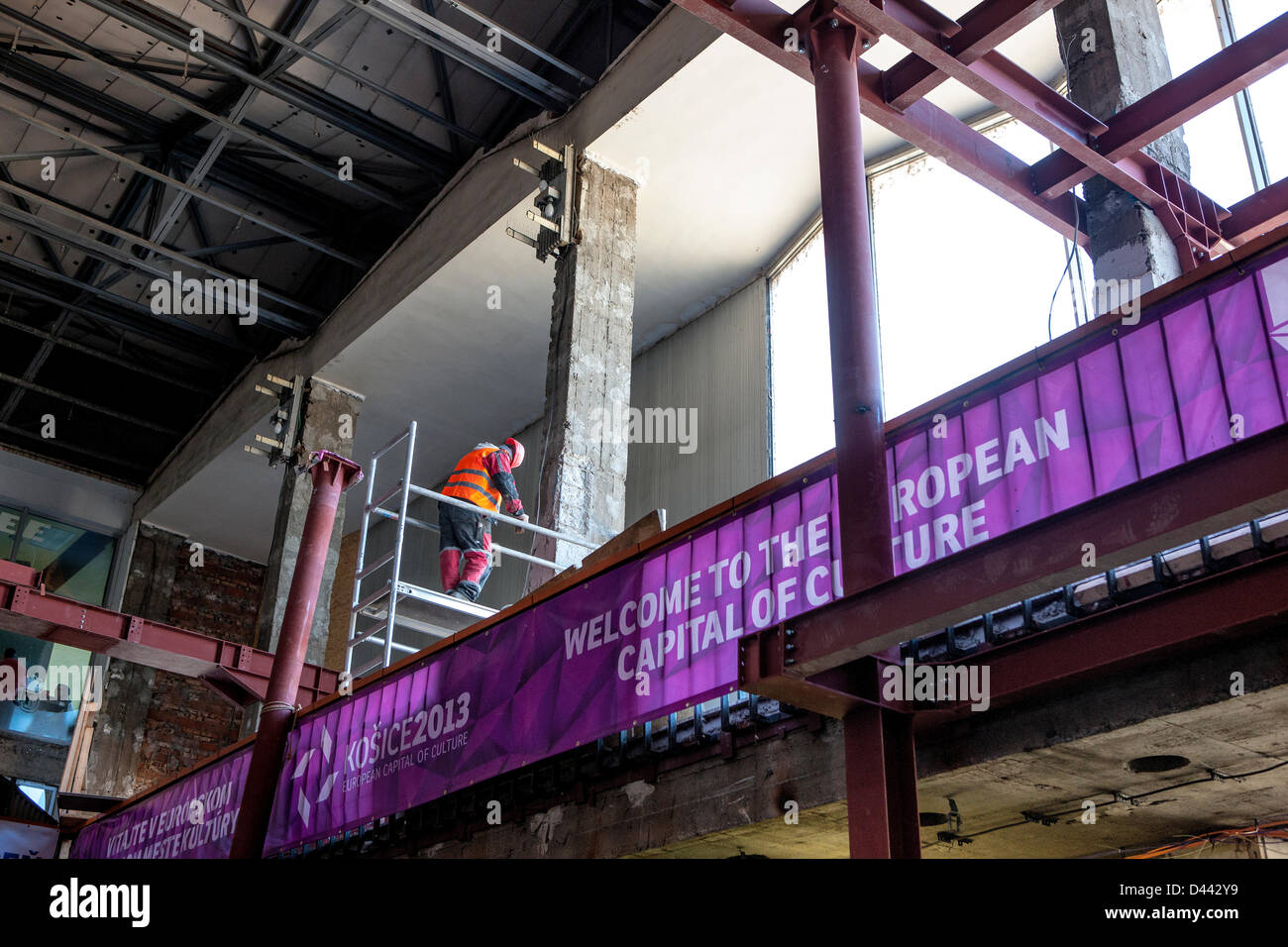 A workman at the main railroad station of Kosice, in eastern Slovakia, working on March 4, 2013, to renovate the station. Kosice, along with the French city of Marseille, is European Capital of Culture for 2013. The Slovak city is racing to get the railway station and cultural sites ready for the influx of summer visitors. Much work remains to be done, but the city aims to be ready. Stock Photo