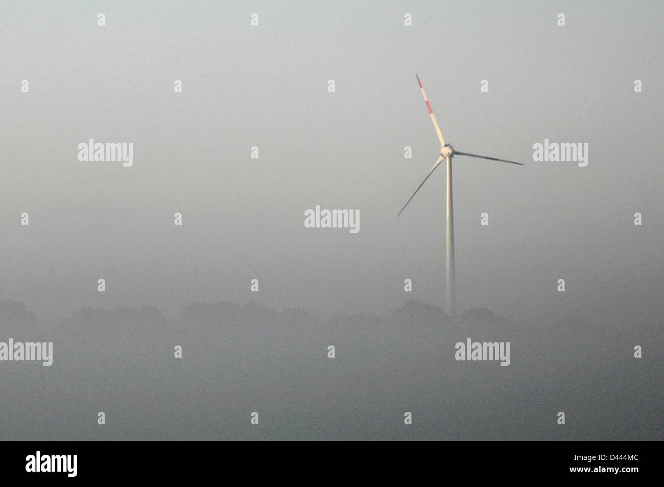 A windmill nearly disappears in the autumn fog in Prignitz, Germany, 1 October 2011. Photo: Berliner Verlag/S.Steinach Stock Photo