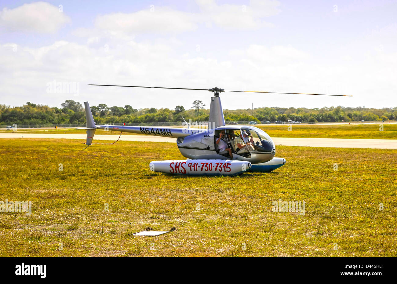 A Robinson R44 Helicopter with floats at venice Airport Florida Stock