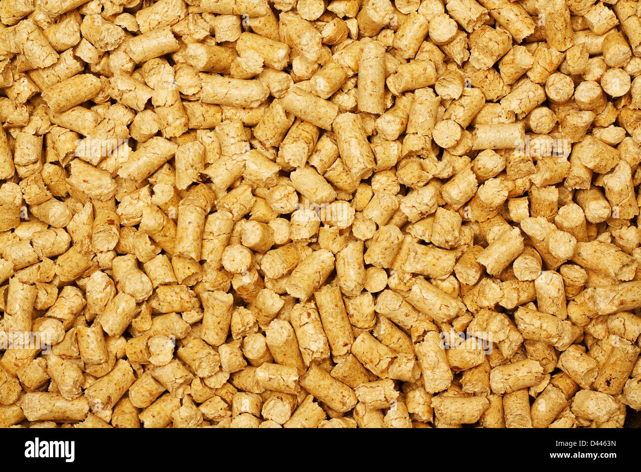Biofuel wood pellet background used in biomass boilers as a renewable source of energy or heat Stock Photo