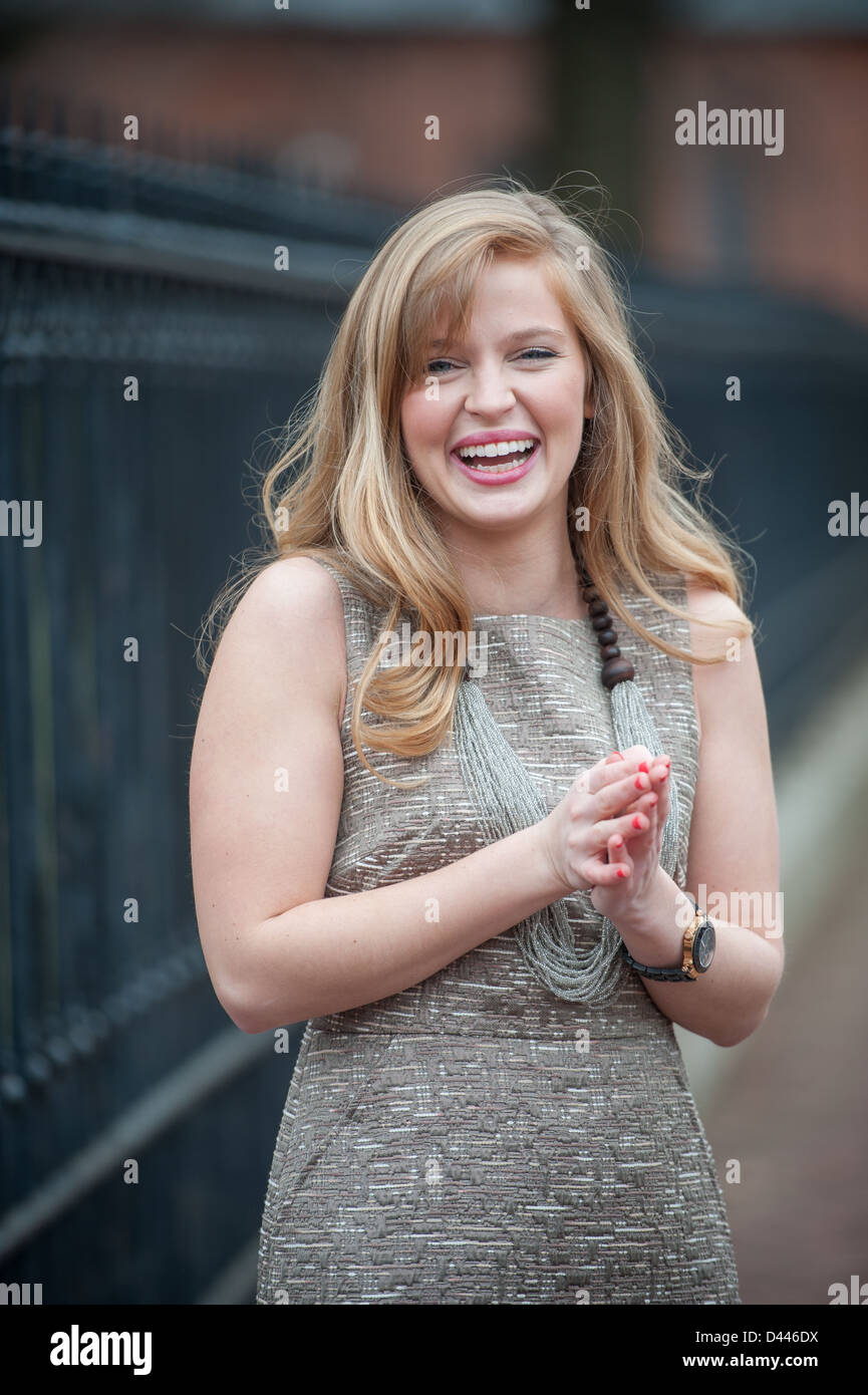 Young blond woman laughing and smiling Stock Photo