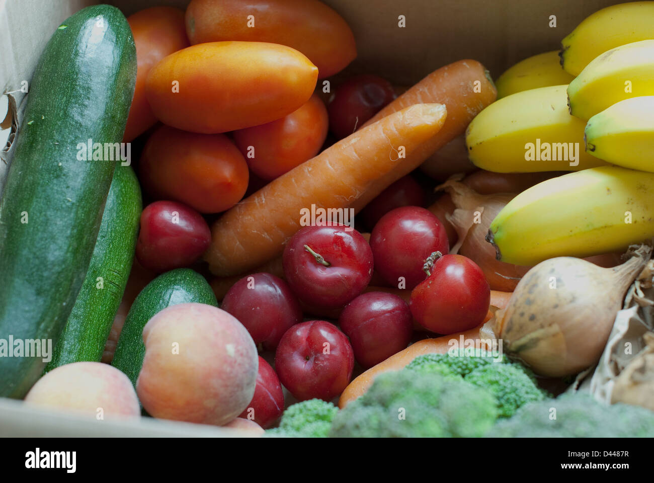 Organic Fruit and vegetables from a veg box Stock Photo - Alamy