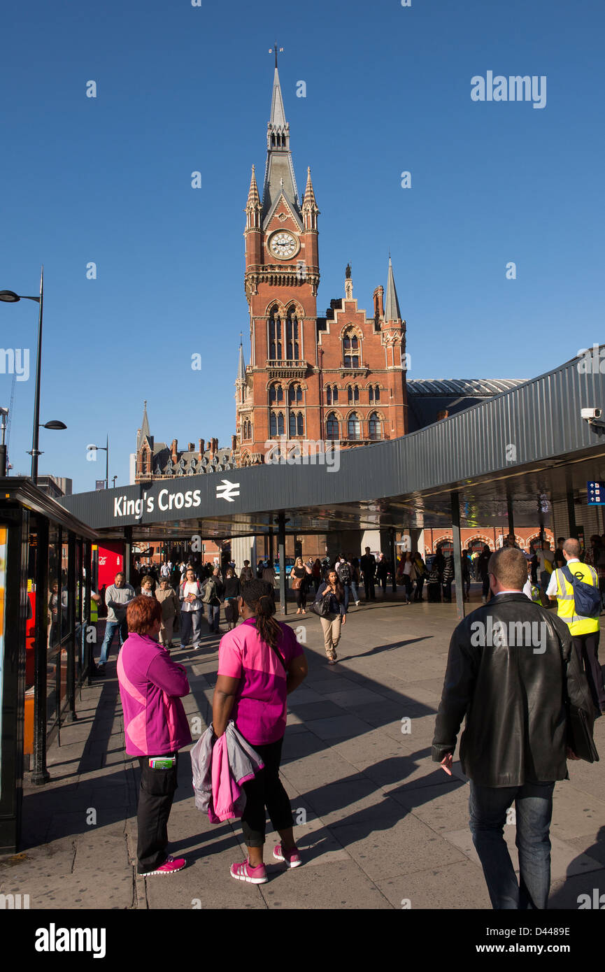 Clock tower of St Pancras International railway station with the entrance to Kings Cross railway