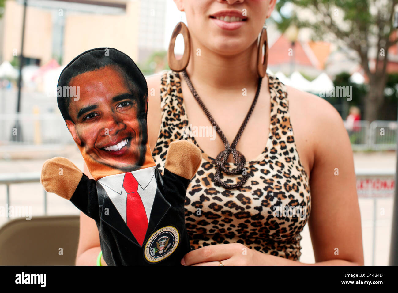 Democratic supporters sell Obama hand-puppets and memorabilia in Charlotte NC, outside the Democratic National Convention. Stock Photo