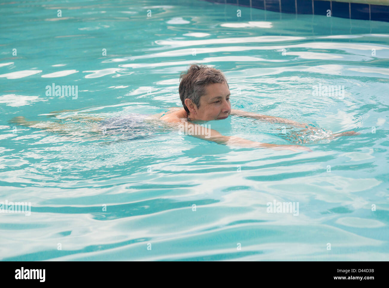 Senior woman swimming pool hi-res stock photography and images - Alamy