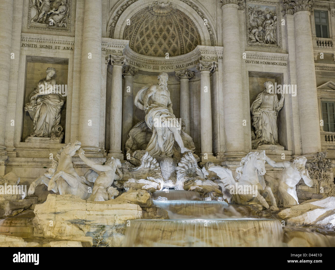 Night time floodlit details of statues in Trevi fountain in Rome Italy Stock Photo