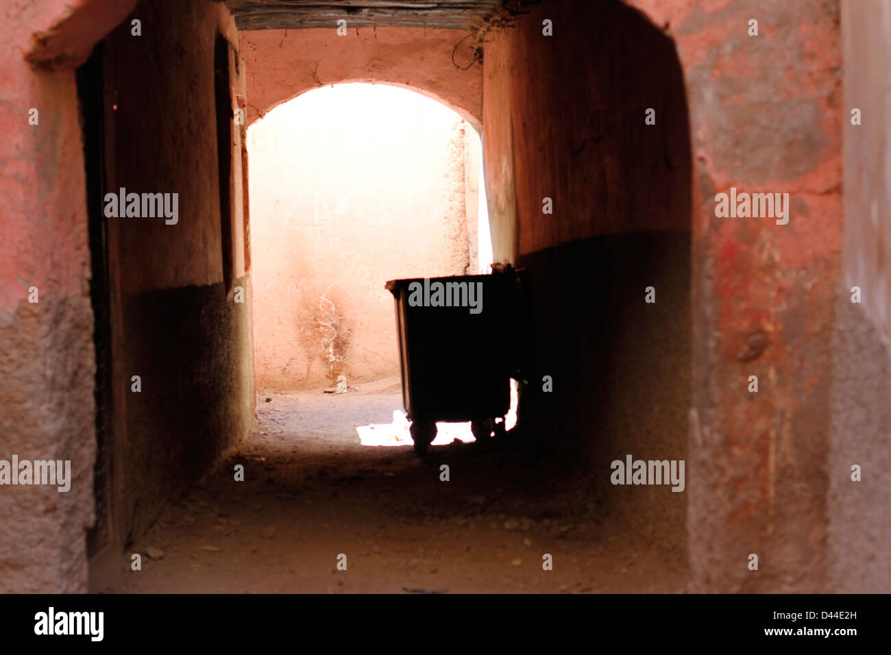 Dumpster in an alleyway Stock Photo