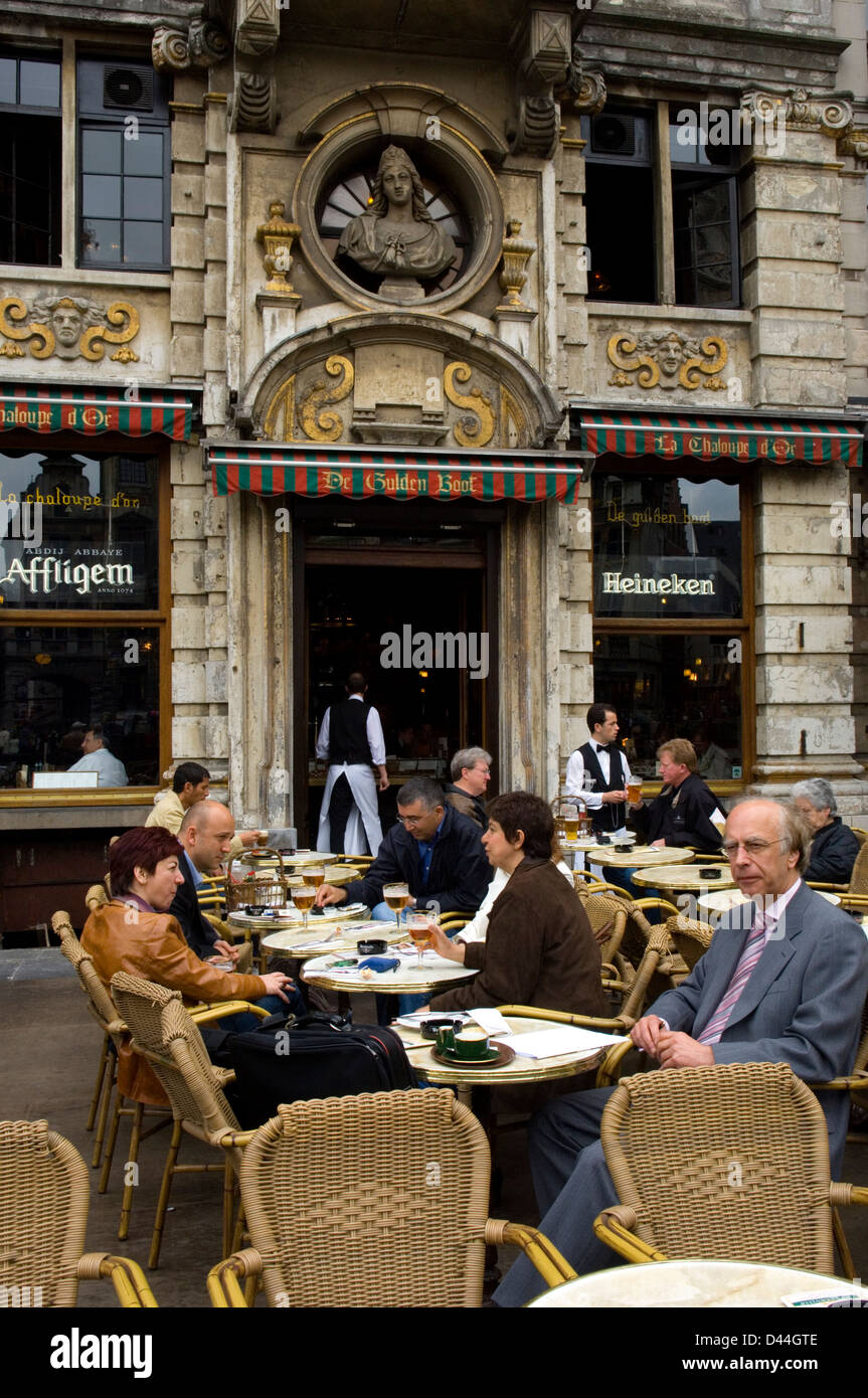People at outdoor cafe on the Grand Place square in Brussels, Belgium Stock Photo