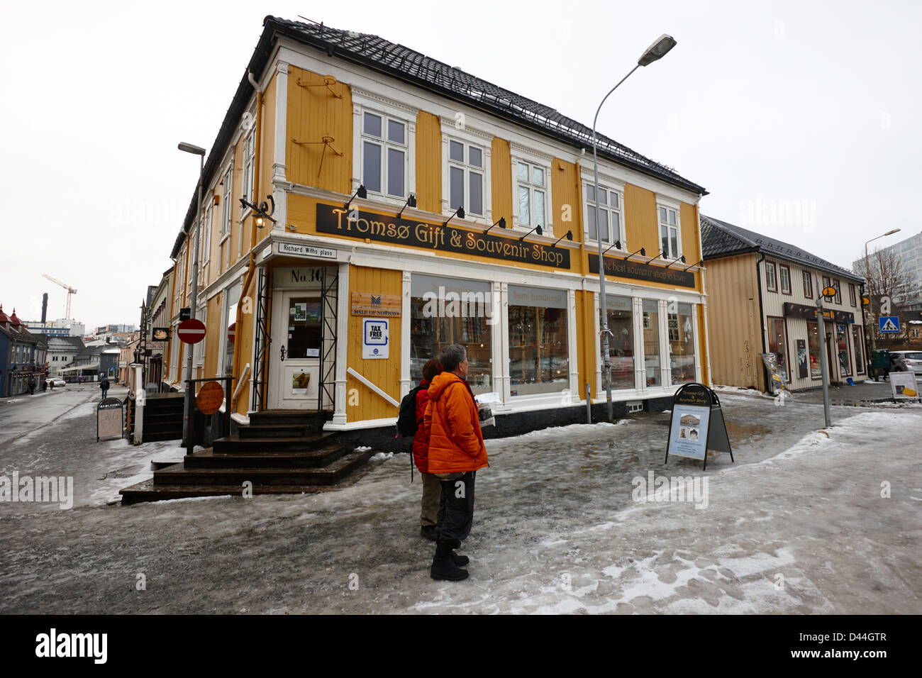 tourists outside Tromso gift and souvenir shop troms Norway europe