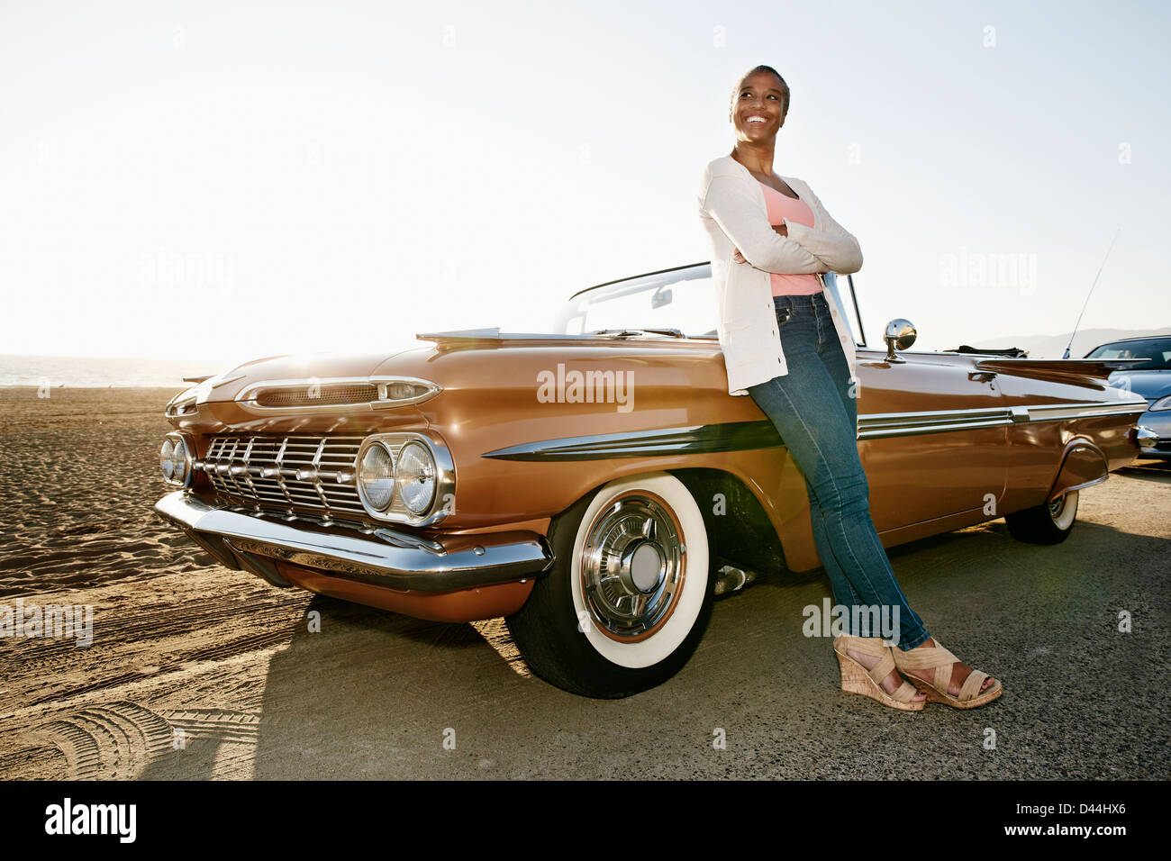 Black Woman Leaning On Convertible Stock Photo Alamy