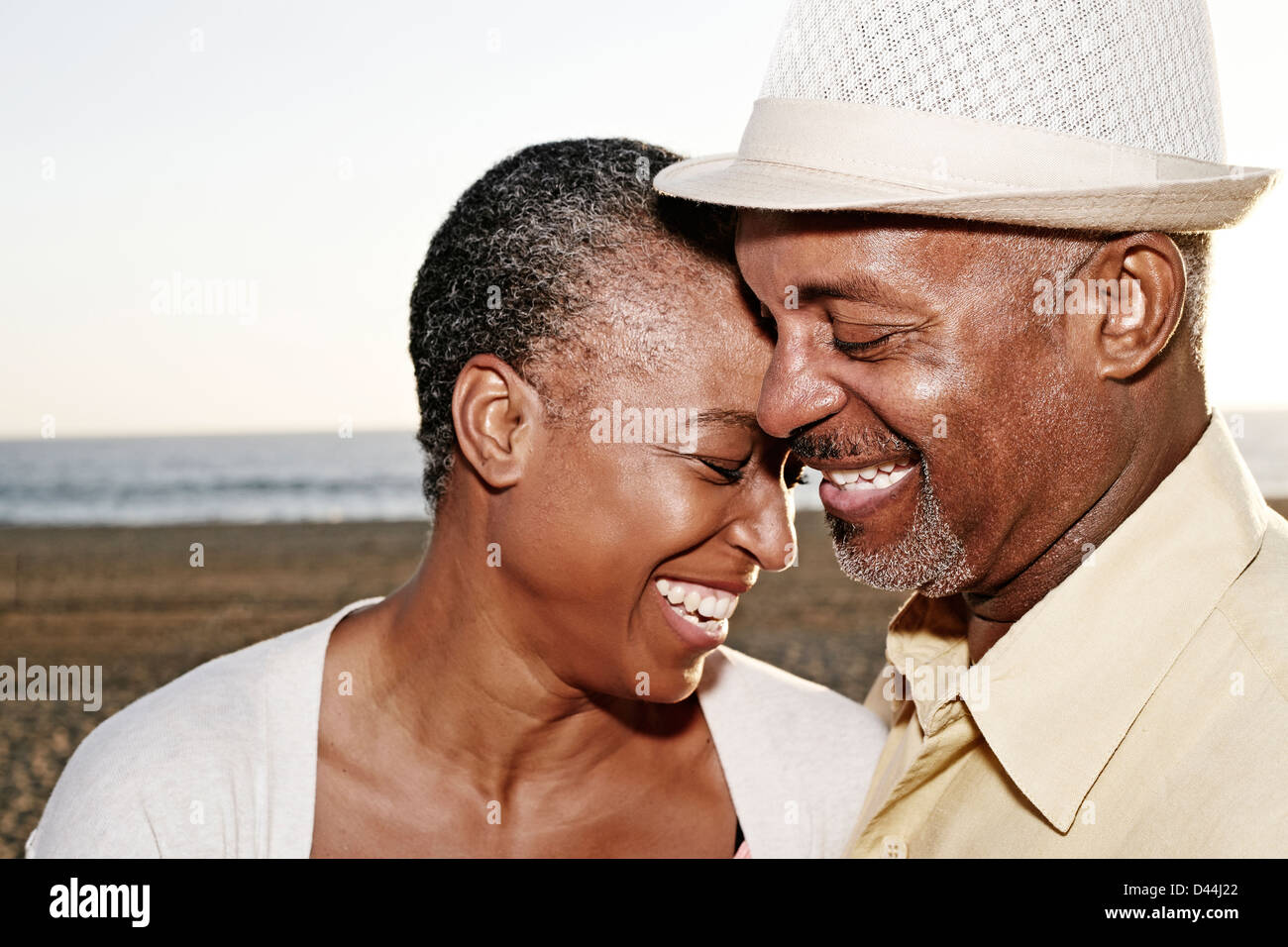 Black couple hugging outdoors Stock Photo - Alamy