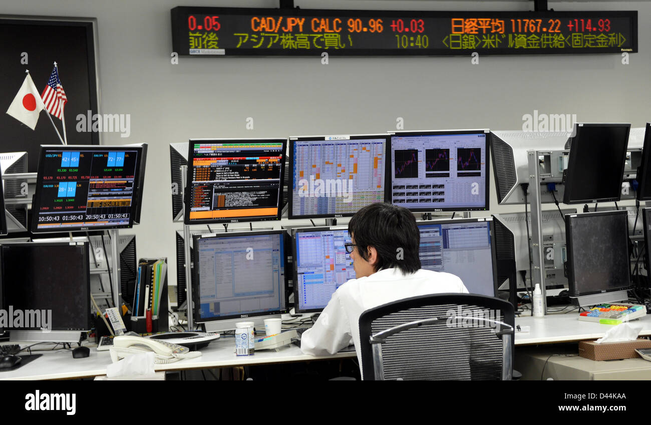 March 5 2013 Tokyo Japan A Forex Trader Operates Terminals As - 