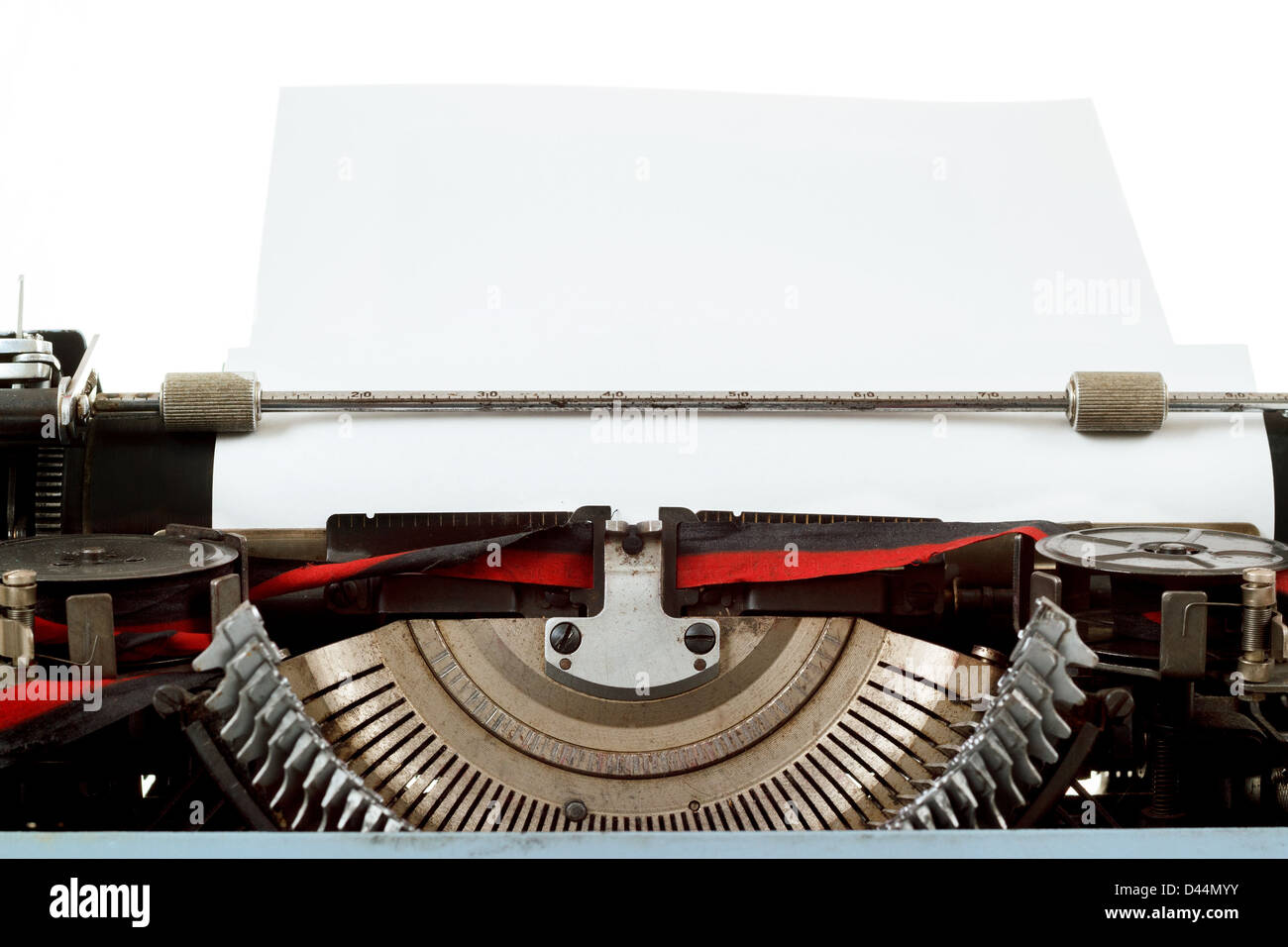 retro typewriter close up with paper and letters mechanism Stock Photo