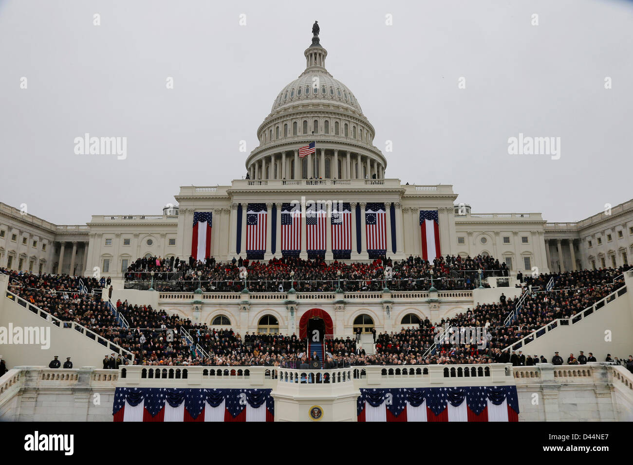 United States President Barack Obama waves to spectators after his speech at the ceremonial swearing-in at the U.S. Capitol during the 57th Presidential Inauguration in Washington, Monday, January 21, 2013. Credit: Scott Andrews / Pool via CNP Stock Photo