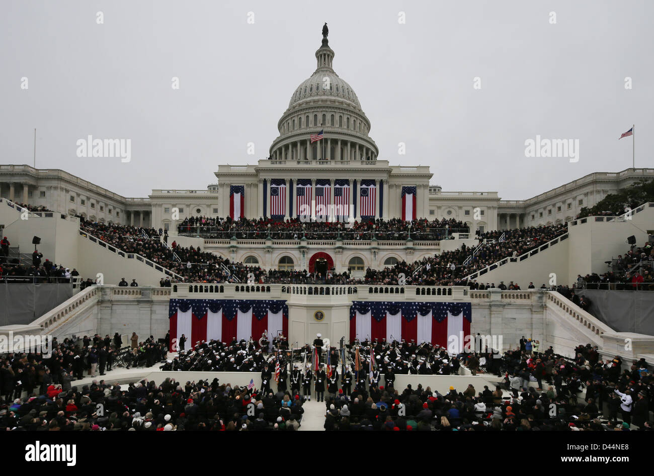 United States President Barack Obama waves to spectators after his speech at the ceremonial swearing-in at the U.S. Capitol during the 57th Presidential Inauguration in Washington, Monday, January 21, 2013. Credit: Scott Andrews / Pool via CNP Stock Photo