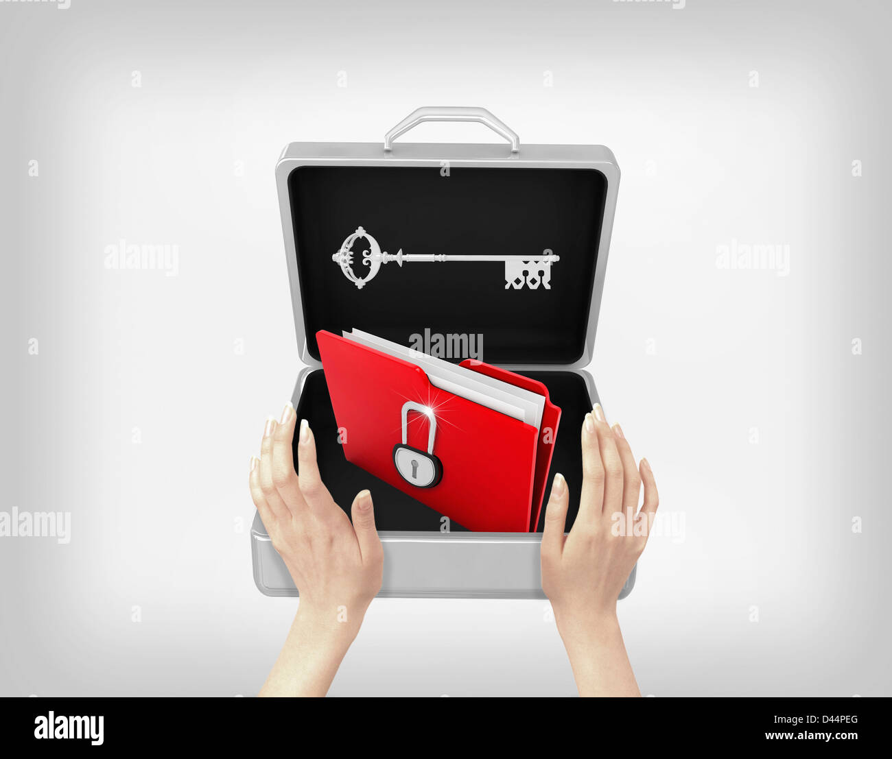 a hand putting a folder in a suitcase Stock Photo Alamy