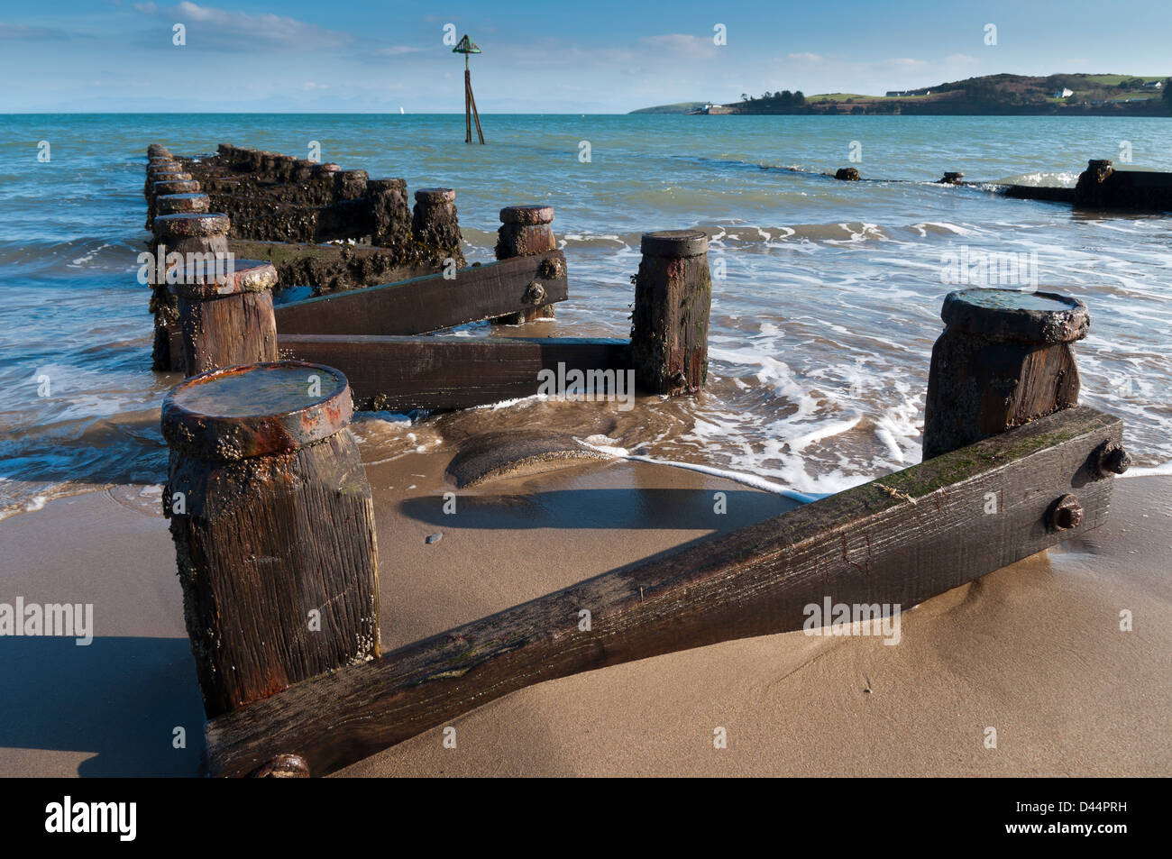 Wooden Groynes on Abersoch beach Stock Photo