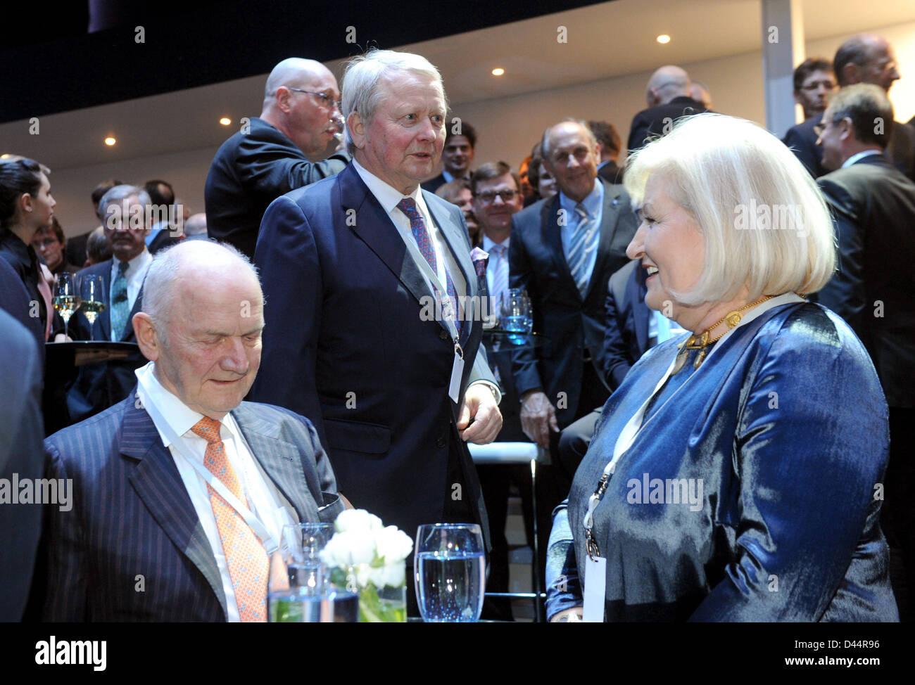 Ferdinand Piech (L), chairman of the supervisory board of Volkswagen, his wife and supervisory board member Ursula Piech and Wolfgang Porsche, chairman of the supervisory board of Porsche (C), attend a motor show hosted by the Volkswagen Group on the evening prior to the first press day of the 83rd International Motor Show Geneva in Geneva, Switzerland, 04 March 2013. Photo: Uli Deck Stock Photo