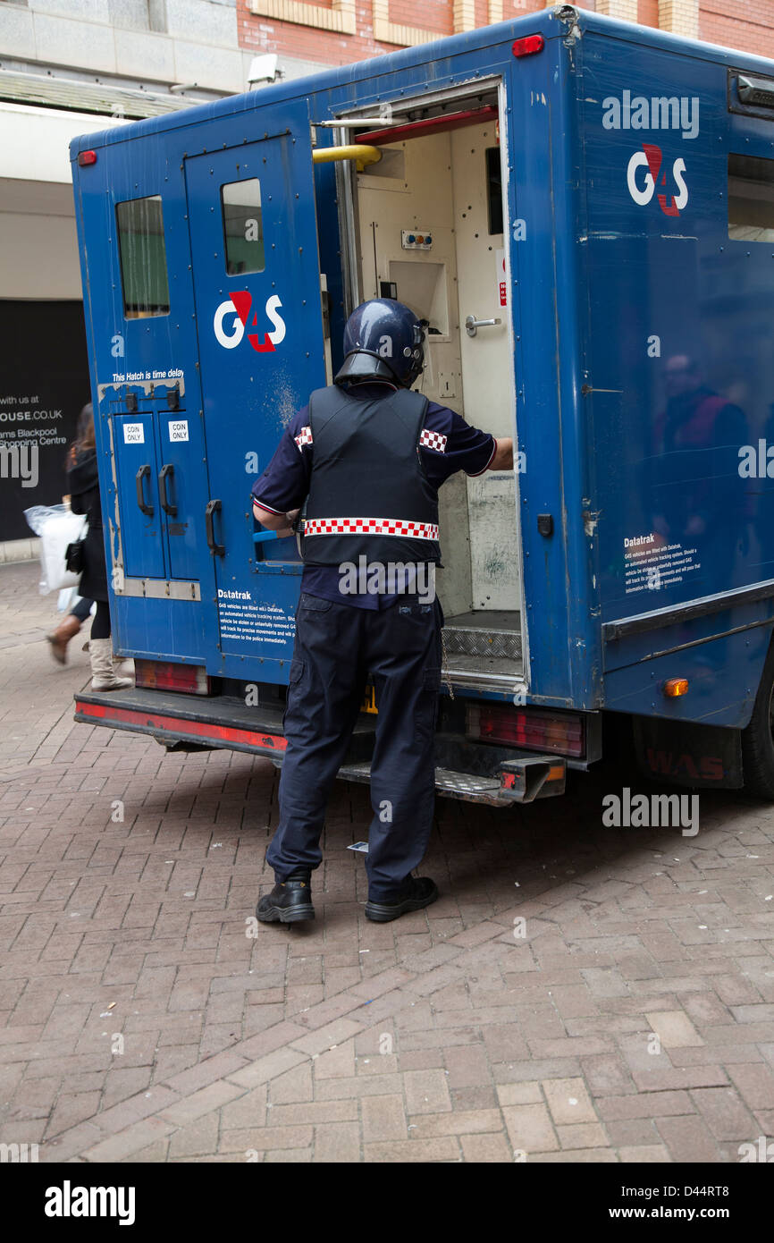 G4S Loading Security Van through rear door of armoured Vehicle in Stock