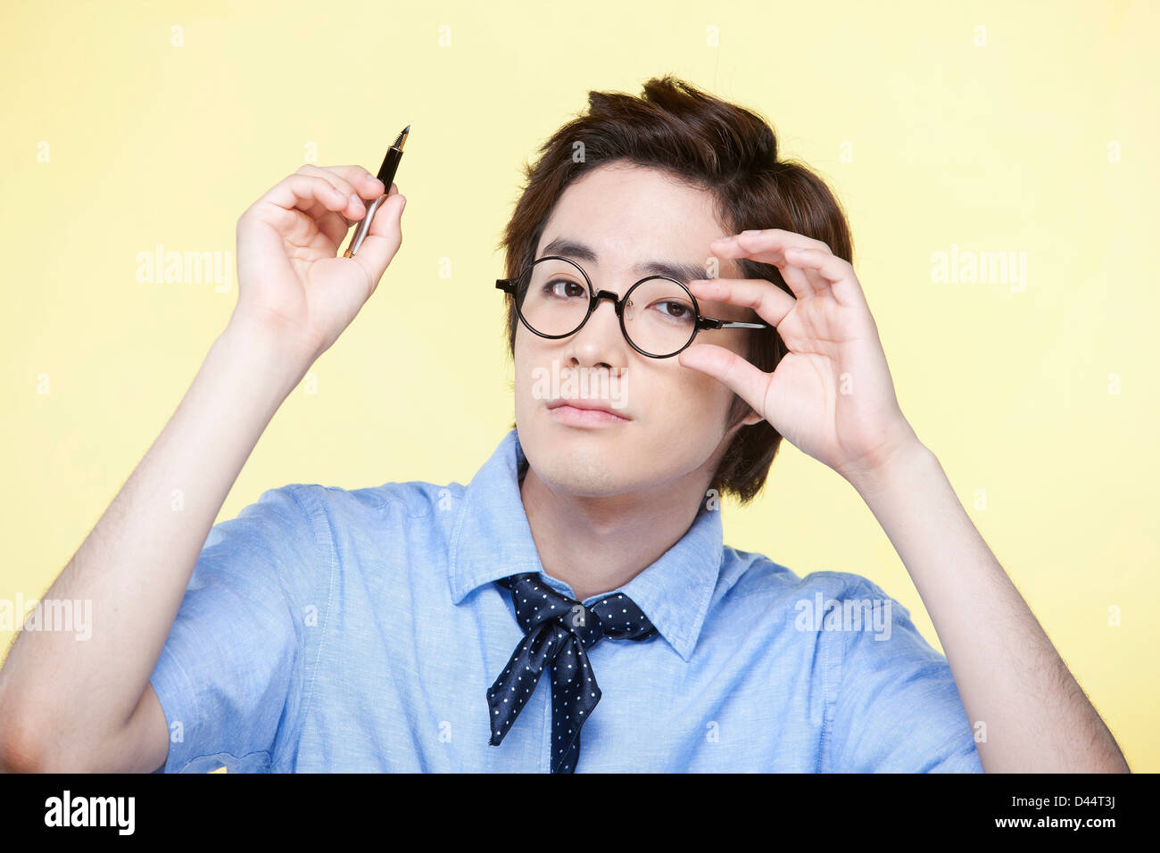Man in glasses blue shirt hi-res stock photography and images - Alamy