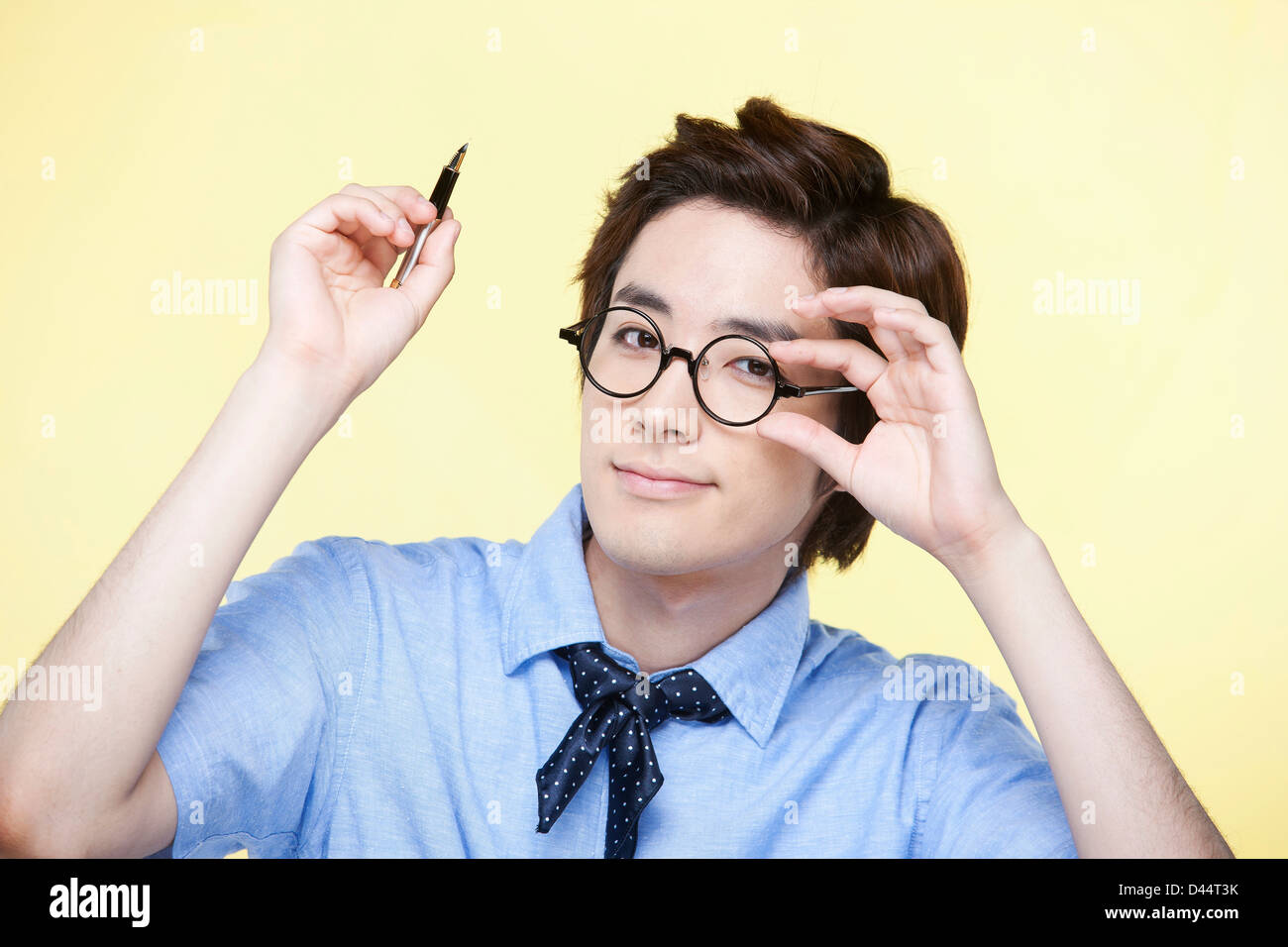 Man in glasses blue shirt hi-res stock photography and images - Alamy