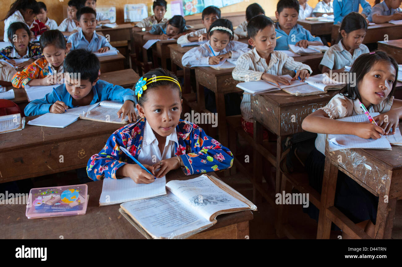 Young girl in school paying attention to the teacher in a Cambodia Cambodia school Stock Photo