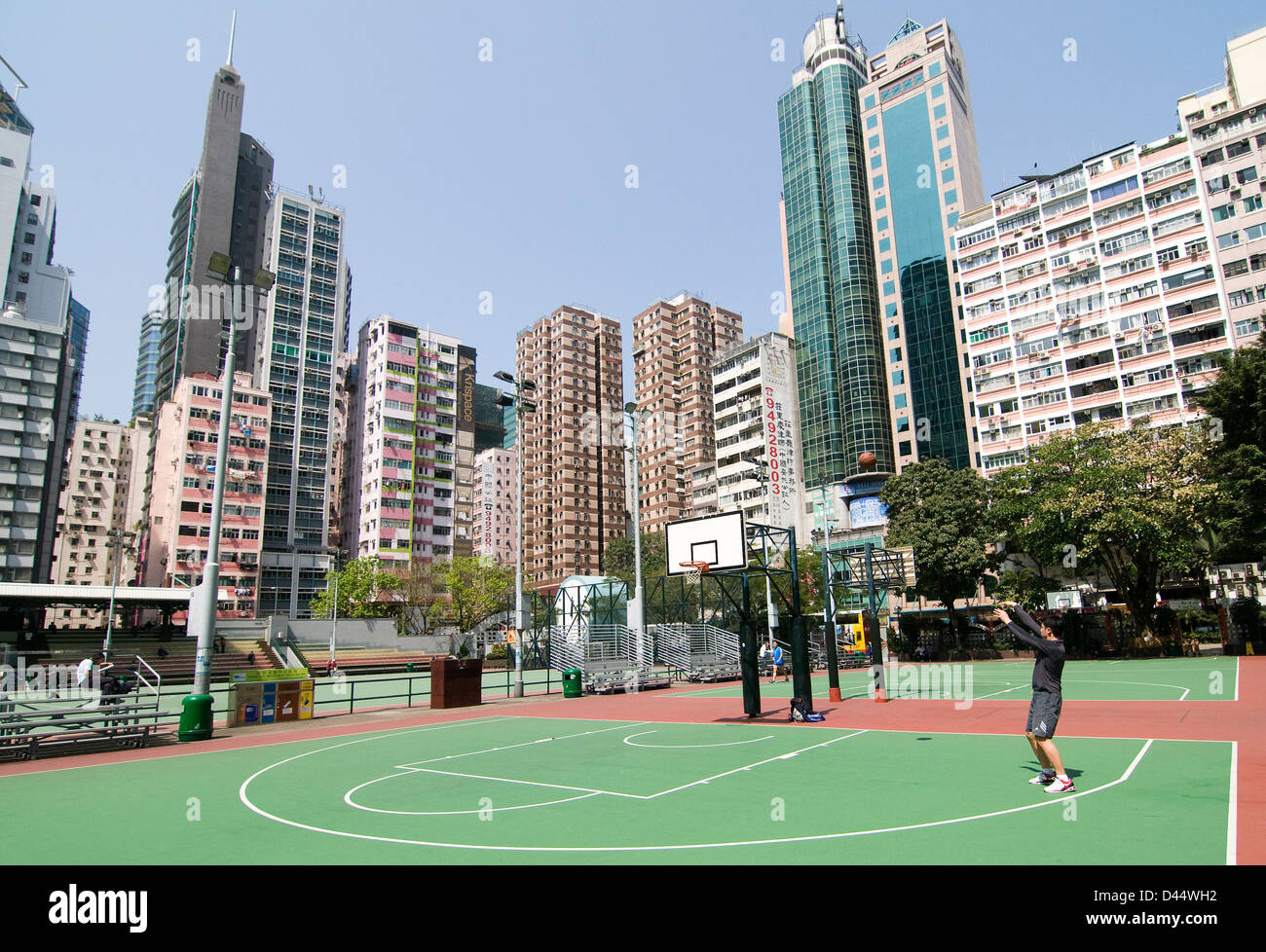 Urban basketball courts in the center of Hong Kong. Stock Photo