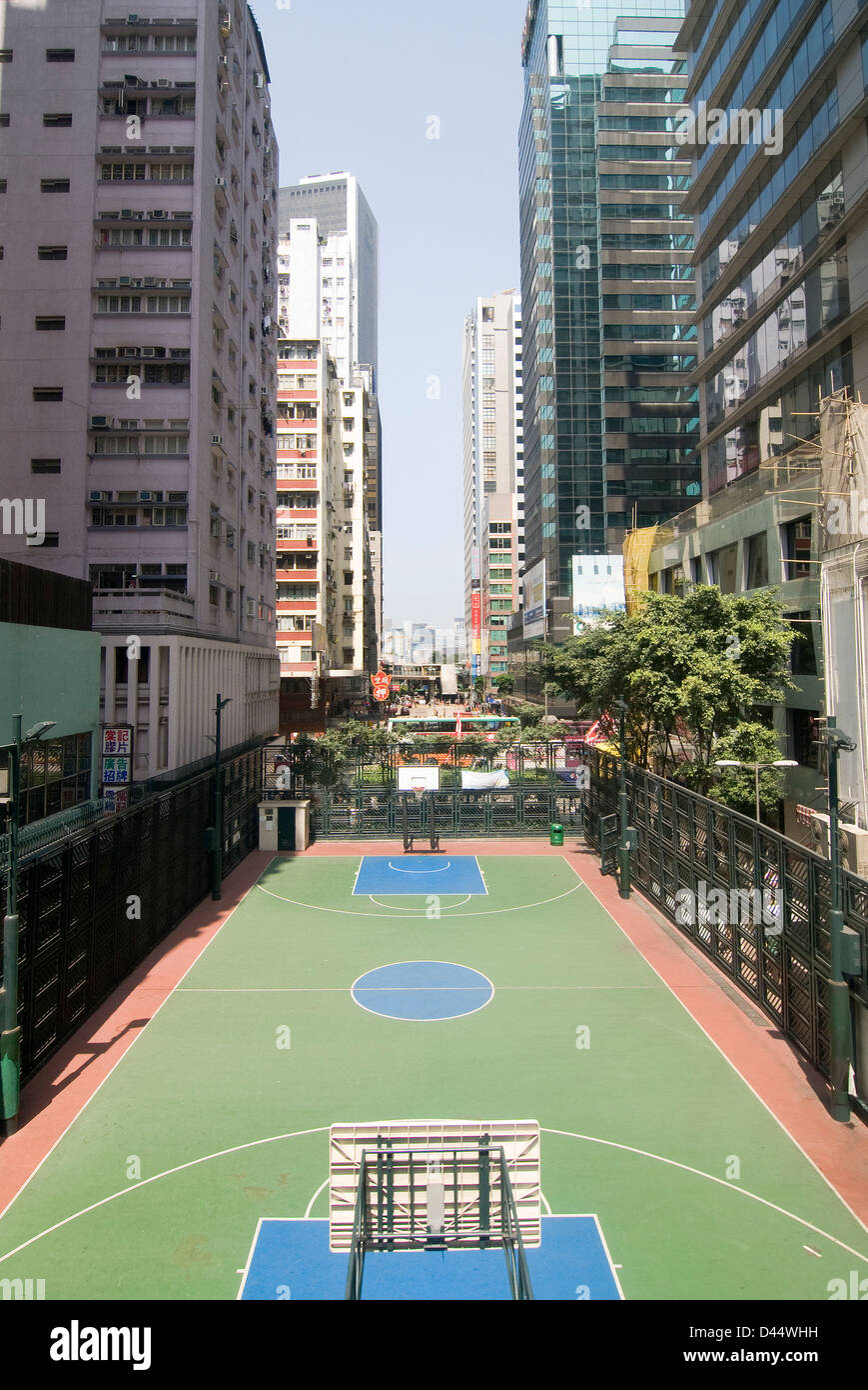 Urban basketball courts in the center of Hong Kong. Stock Photo