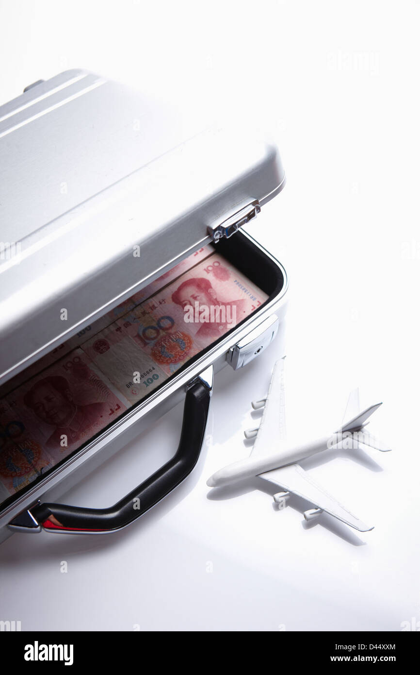 a suitcase filled with Chinese money Stock Photo