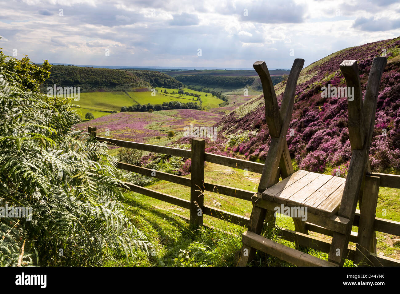 Stile overlooking the Hole of Horcum, North Yorkshire in summer colours Stock Photo