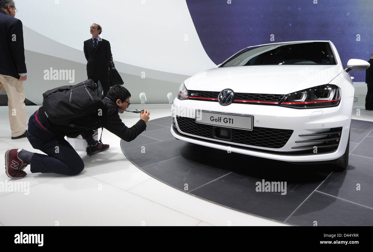 The new VW Golf GTI is on display during the first press day at the 83th  Geneva Motor Show in Geneva, Switzerland, 5 March 2013. Photo: Uli Deck  Stock Photo - Alamy