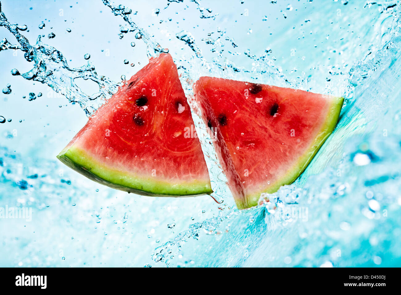 Watermelon splash and sinking isolated against white Stock Photo. fresh wat...