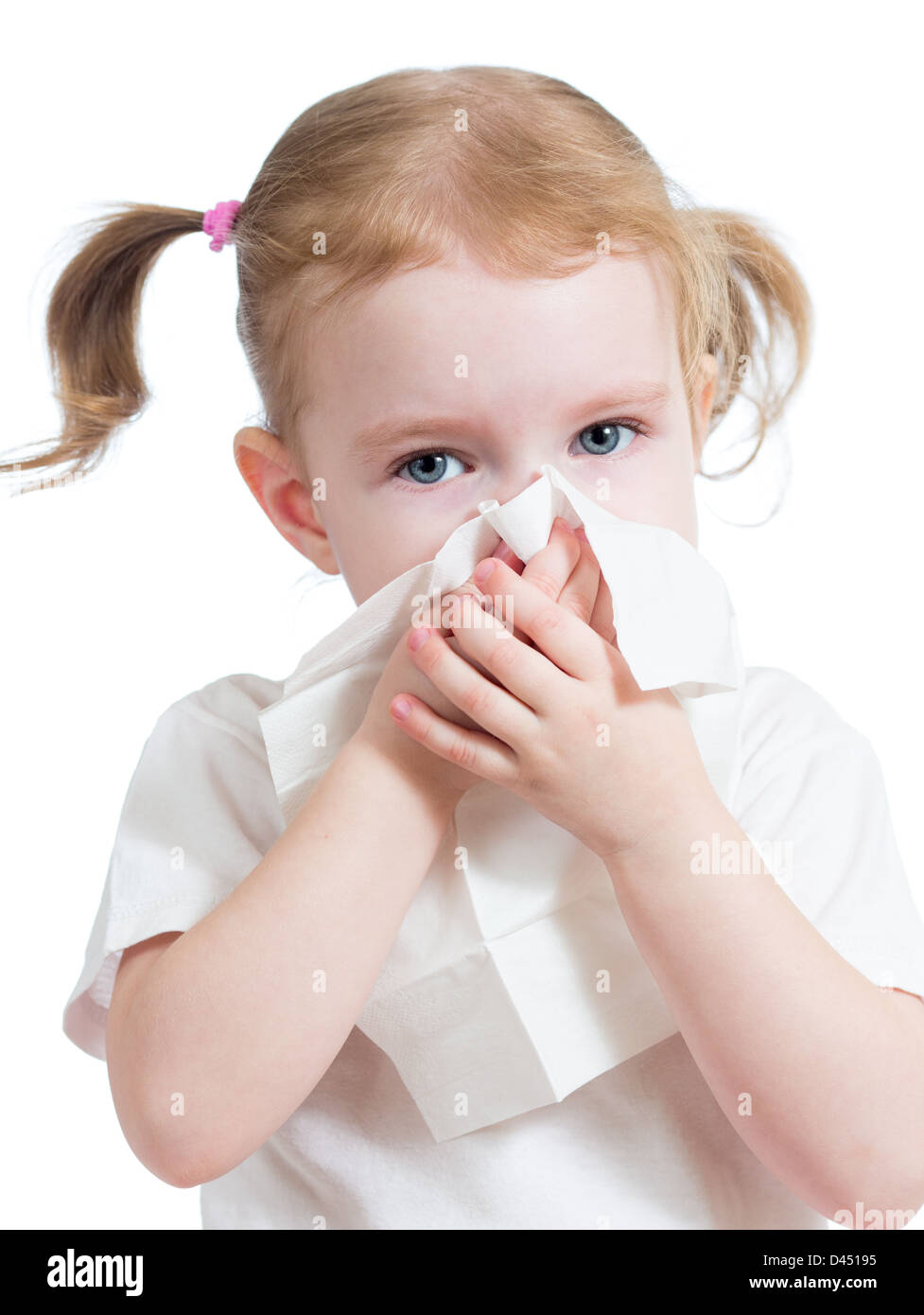 kid cleaning nose with tissue isolated on white Stock Photo Alamy