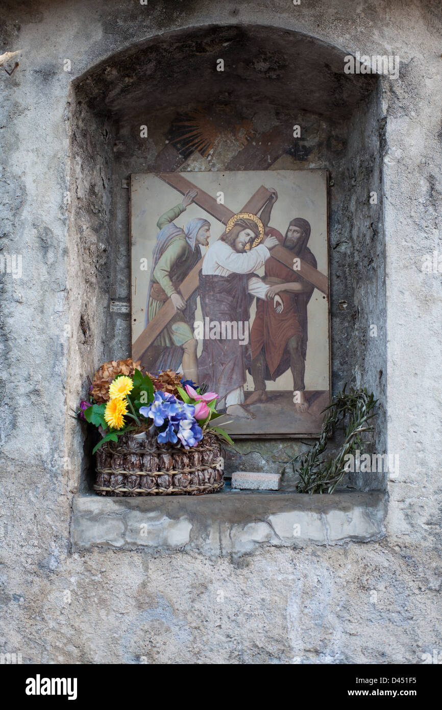 a stone altar with drawn Jesus, Ticino, Switzerland Stock Photo